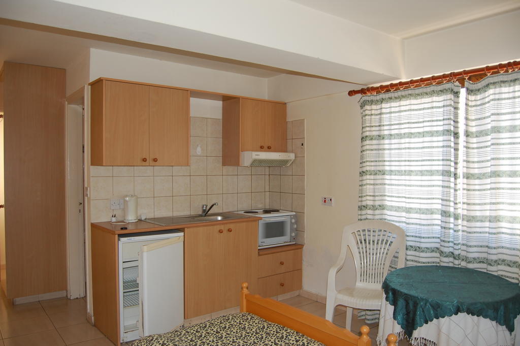 Nicos & Olympia Apartments Полис Стая снимка